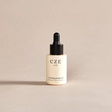 Load image into Gallery viewer, C Z E Nourishing Hair Oil Perfume Hyde Boutique